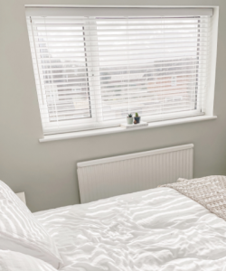 white wooden bedroom blinds